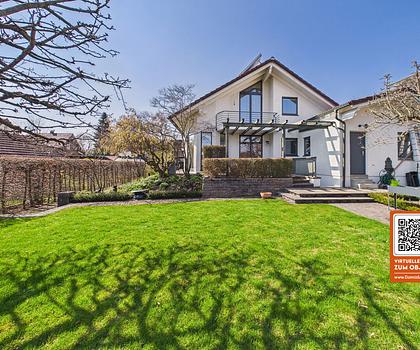 Traumhaftes Einfamilienhaus mit idyllischem Architektengarten