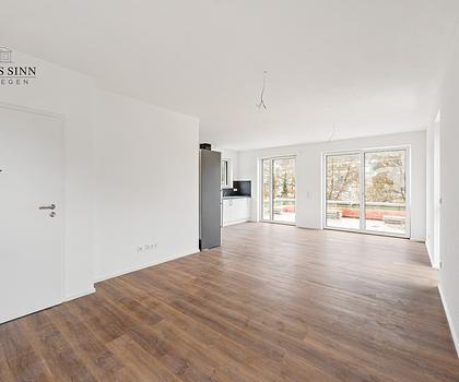 NEUBAU - Modernes Wohnen mit Komfort - 2,5 Zimmer DG-Wohnung mit Dachterrasse und Kfz-Stellplatz