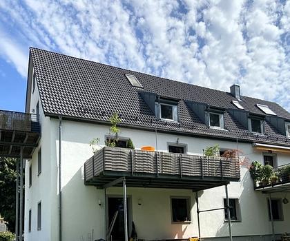 3-Zimmer-Wohnung mit 400 m² Gartenanteil, Sonnenterrasse und beheizten Hobby-Raum in Unterföhring!