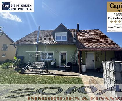 Charmantes Einfamilienhaus mit großem Garten, Garage und viel Platz für die ganze Familie - Ein Objekt von Ihrem Immobilienpartner SOWA Immobilien und Finanzen