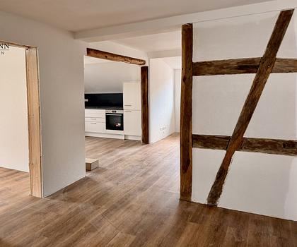 Großzügiges Wohnen auf zwei Ebenen – 5,5-Zimmer Maisonette Wohnung mit Dachterrasse & Fachwerk