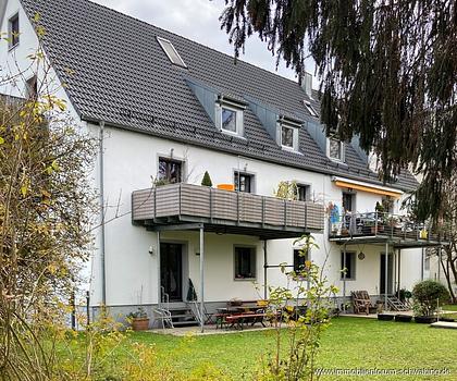 3-Zimmer-Wohnung mit Sonnenterrasse, 400 m² Gartenanteil und beheizten Hobby-Raum in Unterföhring!